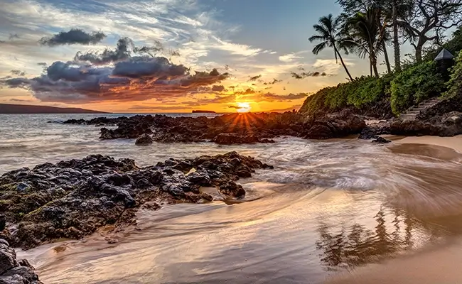 » Country Heritage Tours Hawaiian beach at Sunset with volcanic rocks