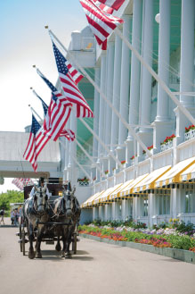 » Country Heritage Tours Grand Hotel exterior shot with horse drawn carriage