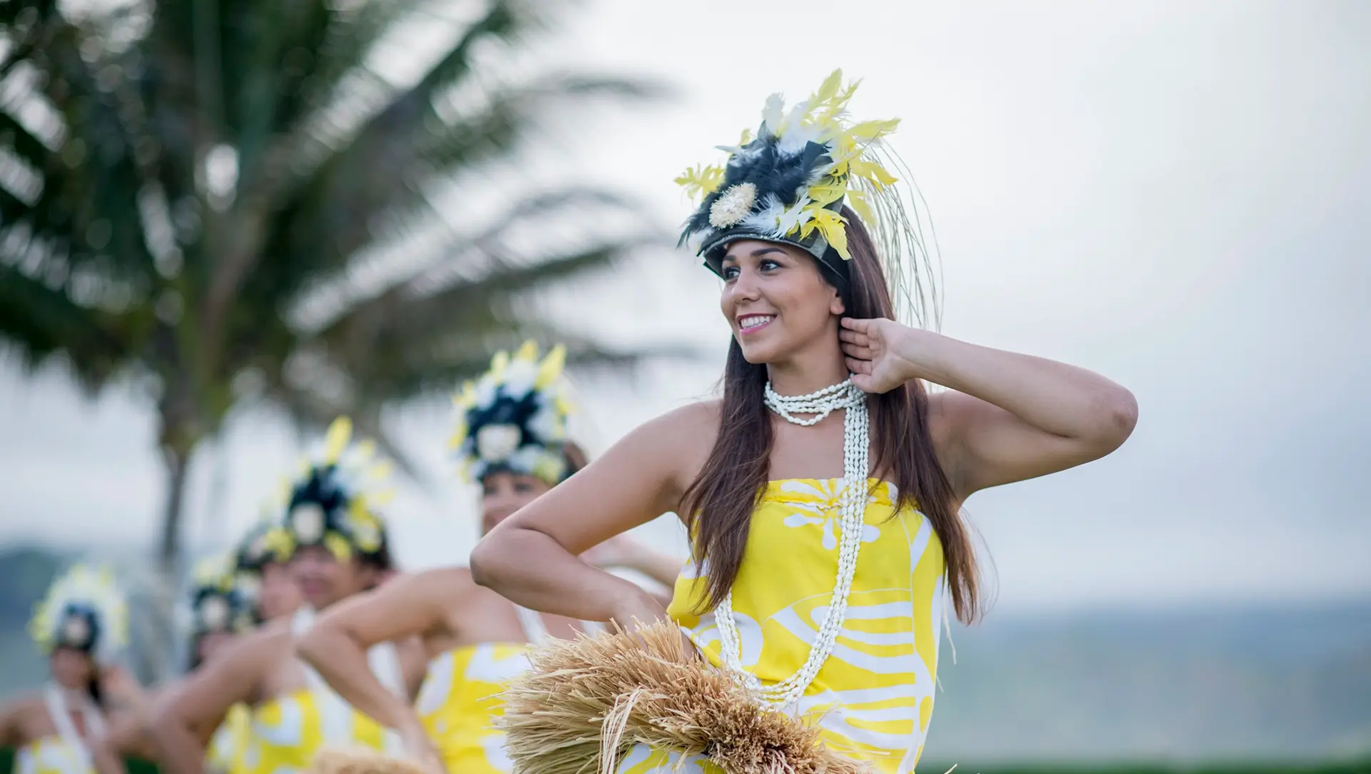» Country Heritage Tours » Country Heritage Tours Line of Hawaiian luau dancers performing
