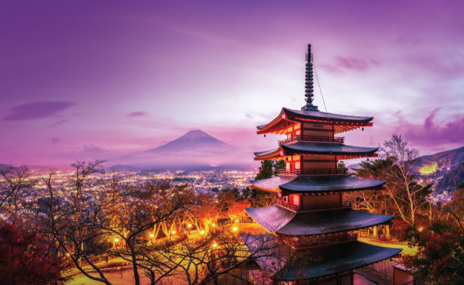 » Country Heritage Tours Pagoda in the foreground with Mount Fuji in the background at Sunset